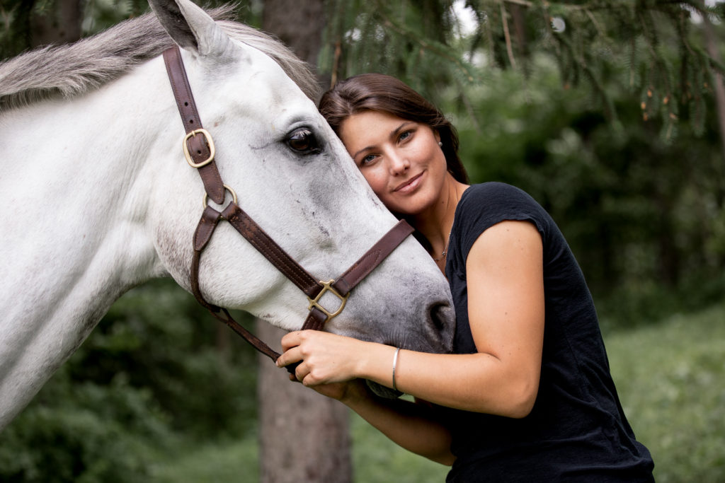 Portrait of woman with horse