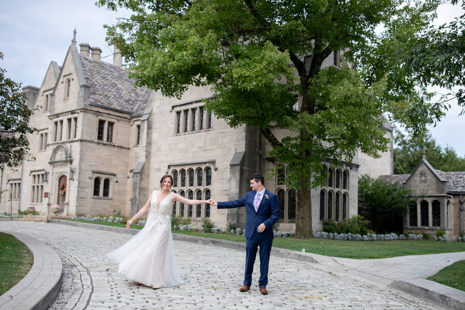 Groom holding bride